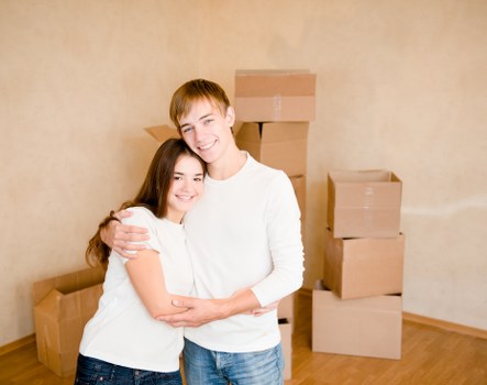 Packed storage boxes and furniture in a Blackheath unit