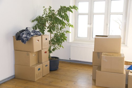Packed boxes and furniture ready for a small move