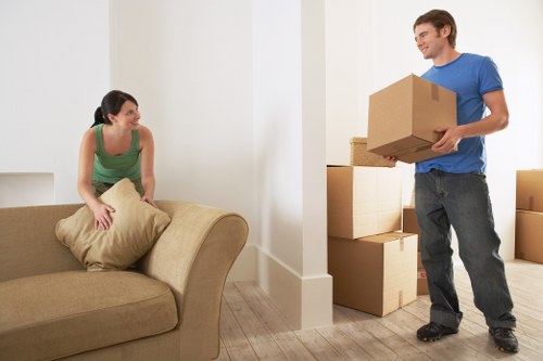 Removal team handling furniture safely during a Blackheath home move